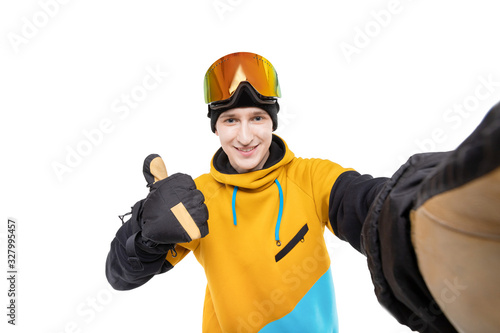Man snowboarder or skier in sportswear take selfie on isolated white background