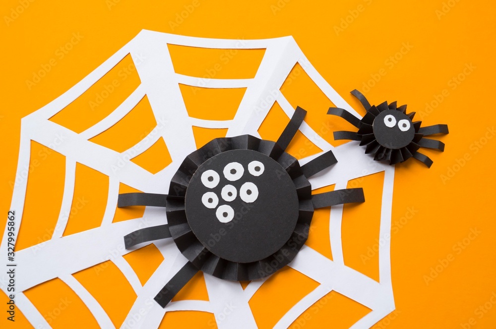 Obraz premium Halloween holiday spider made of paper.