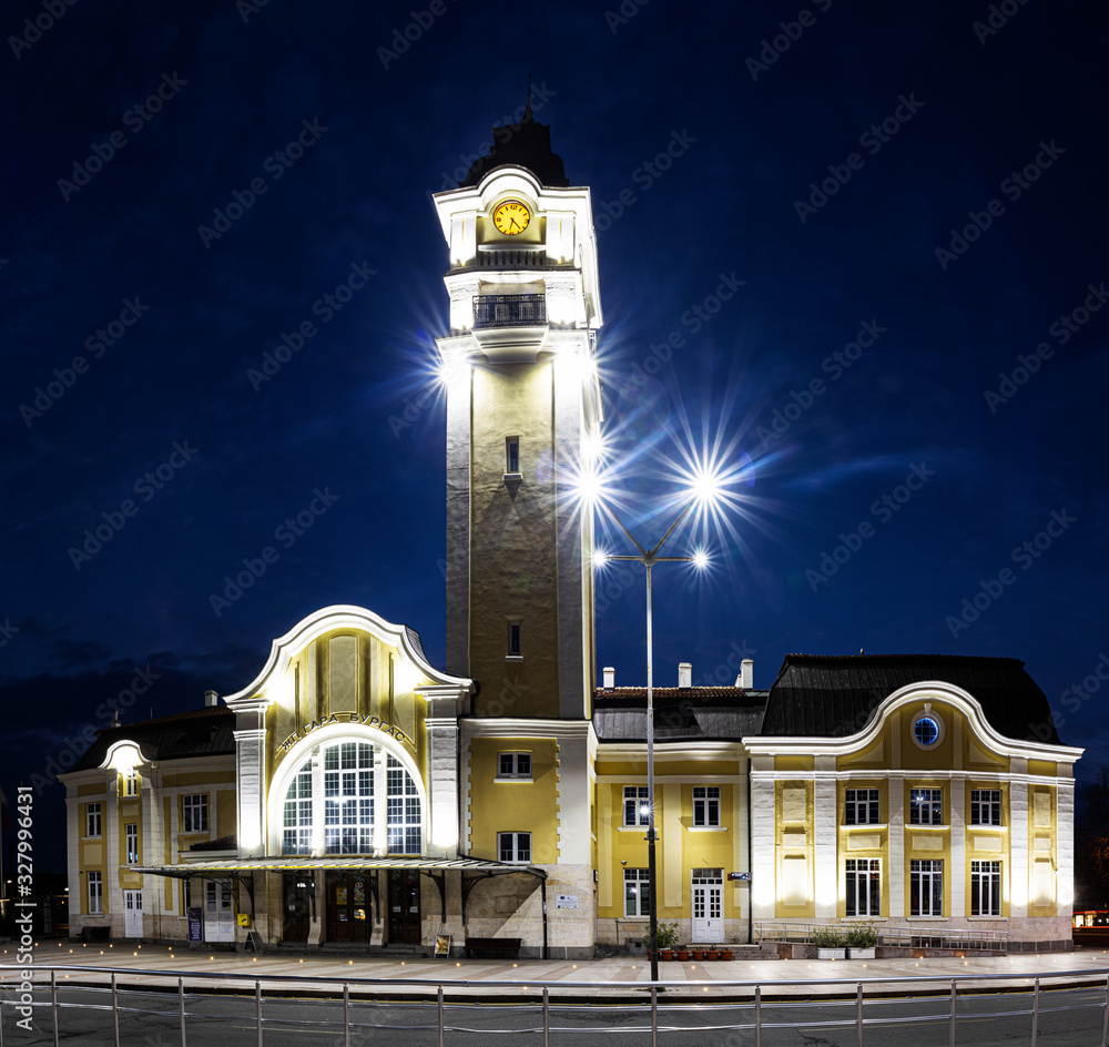 Obraz premium Night view of central trail station in Burgas sity with lights trail traffic.