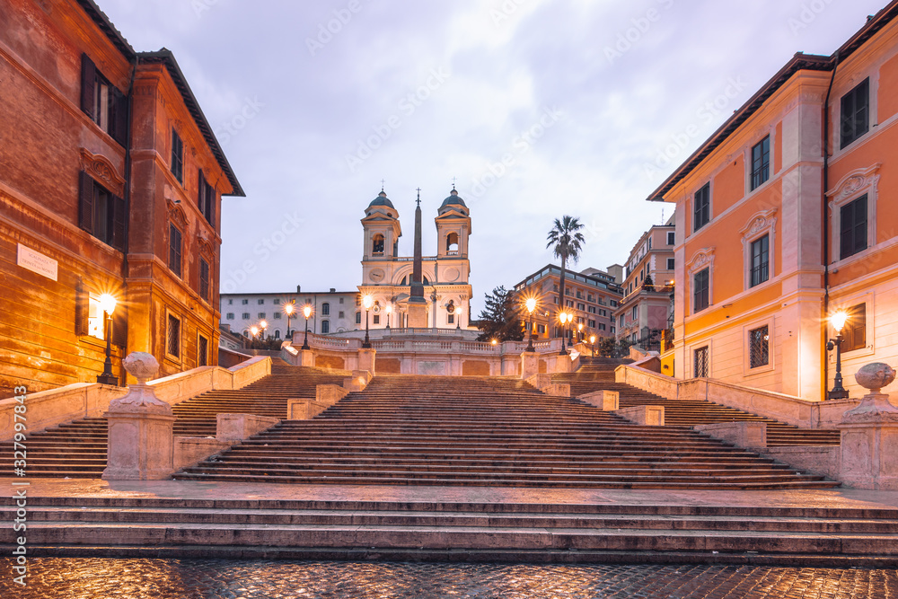 The Spanish stairs in Rome in the morning, cloudy light rain and people empty. Beautiful cityscape

