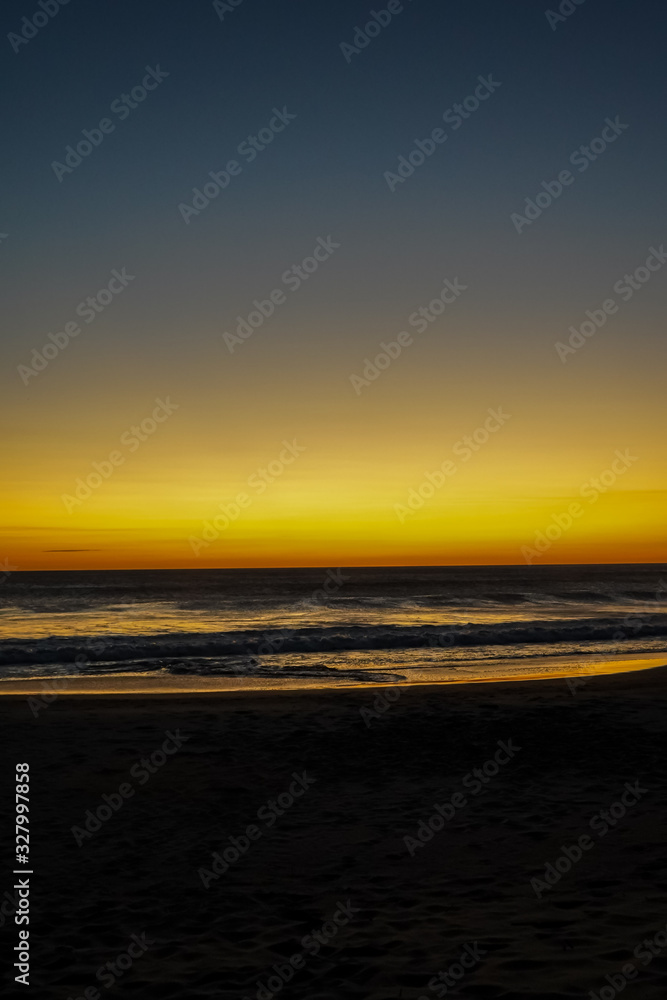 Obraz premium Beautiful aerial view of a sunset in Naranjo Beach - Witch Rock Costa Rica