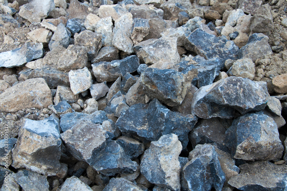 A bunch of stones. The texture is stone. Blue limestone