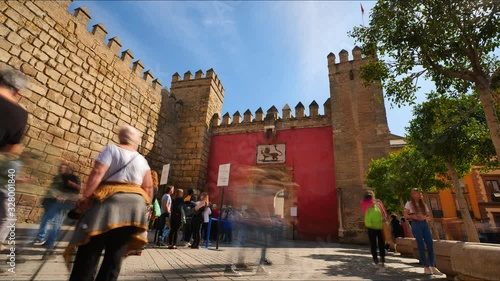 4K Timelapse of people waiting in queue to enter the Royal Alcázar of Seville in Seville City Center. 