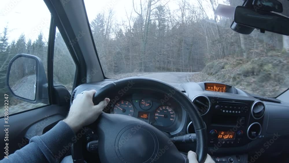Person POV driving car uphill on narrow road 4K