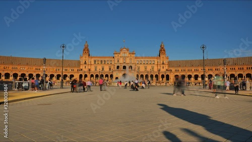 4K Timelapse in Seville famous Spain Square with the fountain, tourists visiting and horse-carriages.