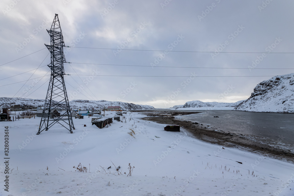 Teriberka, Murmansk region / Russia - 02.19/2020: The old fishing village on the shore of the Barents sea, the Kola Peninsula, Teriberka, Russia Teriberka, Murmansk region / Russia - 02.19/2020: The old fishing village on the shore of the Barents sea, the Kola Peninsula, Teriberka, Russia