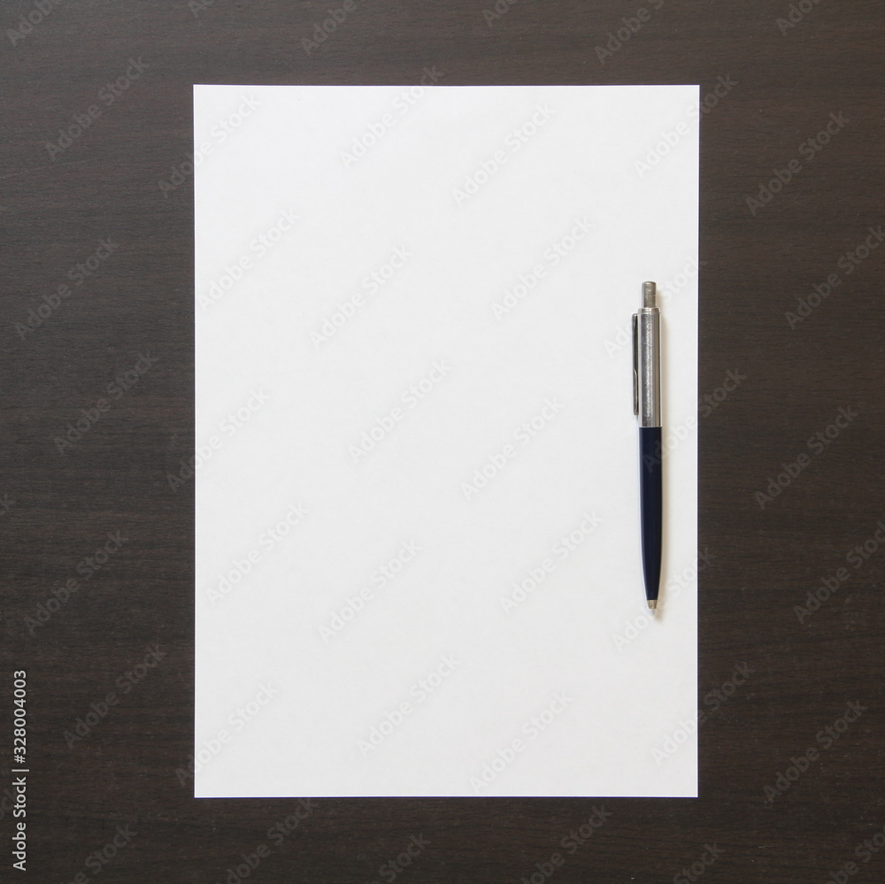 Template of white paper with pen on dark wenge color wooden background. Template of white paper with pen on dark wenge color wooden background.