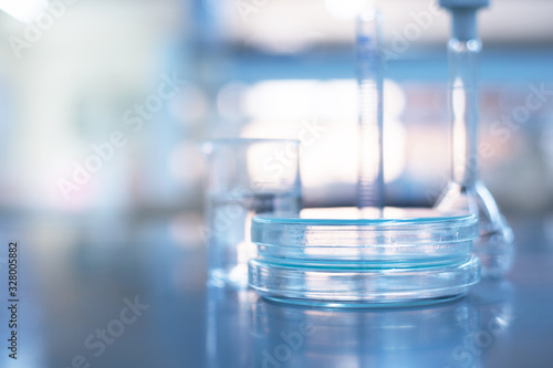 glass plate in blue science microbiology laboratory background