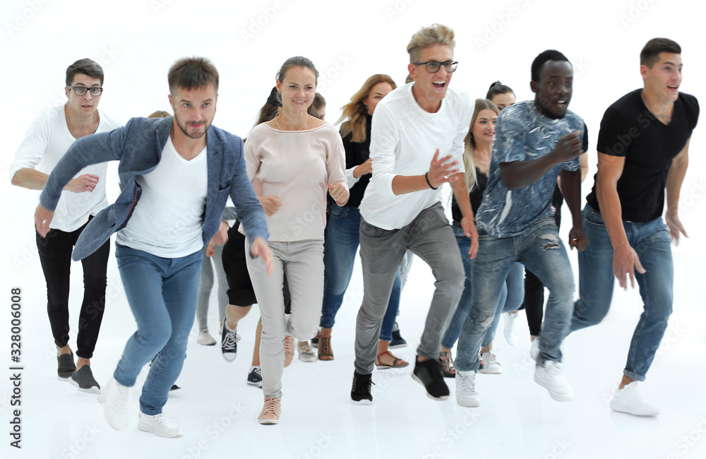 casual group of young people are quickly running towards their goal. casual group of young people are quickly running towards their goal.