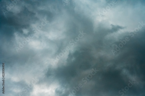 Dark clouds before rain. Dramatic grey cloud and thunderstorm. © Sir