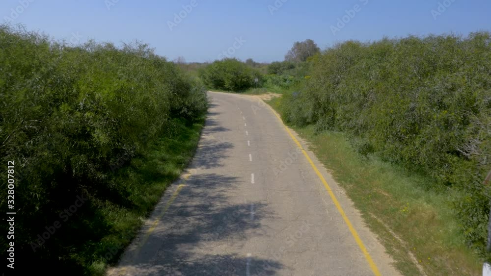 Aerial lift off over road leading to the coastline outside of Tel Aviv. Aerial lift off over road leading to the coastline outside of Tel Aviv.