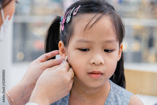 Ear piercing process