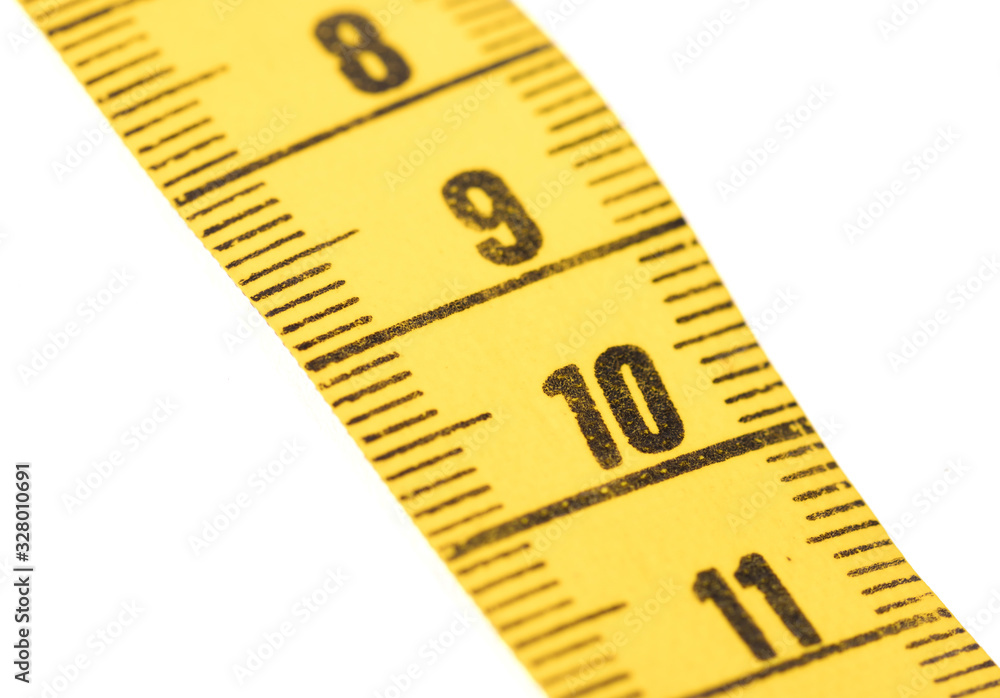 Close-up of a yellow measuring tape isolated on white - 10 Close-up of a yellow measuring tape isolated on white - 10