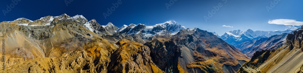 Wide panoramic view of Himalaya mountains Chulu and Gangapurna. Viewpoint at Thorung High Camp. Annapurna circuit trek, Nepal. - obrazy, fototapety, plakaty 