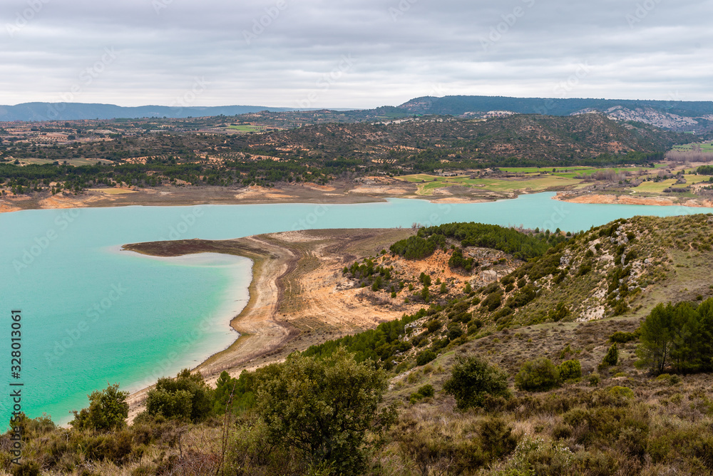 Buendia reservoir with turquoise waters in spring. La Alcarria region, Spain