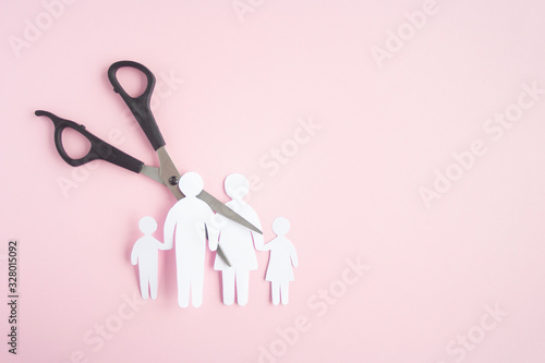 black scissor cutting family paper cut , dysfunctional family, bad children development, divorce parent broken family concept, mental health