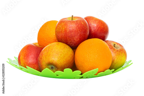 Apples and oranges on a green plate isolated on white background