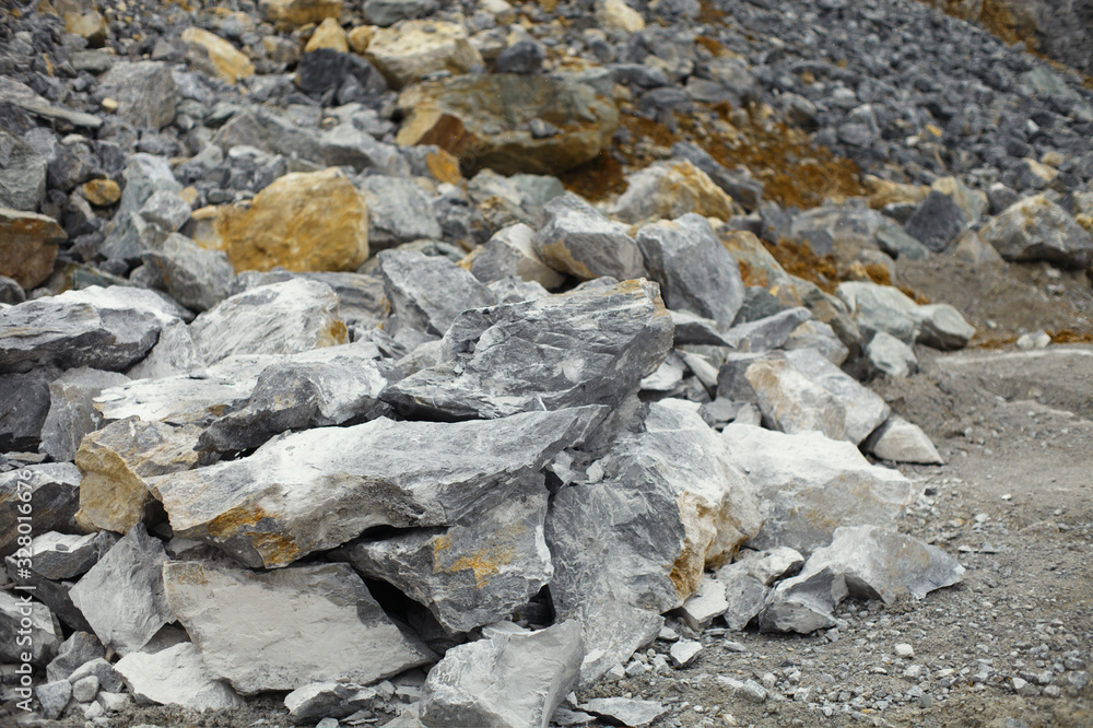 Large stone debris in a limestone quarry, close-up.