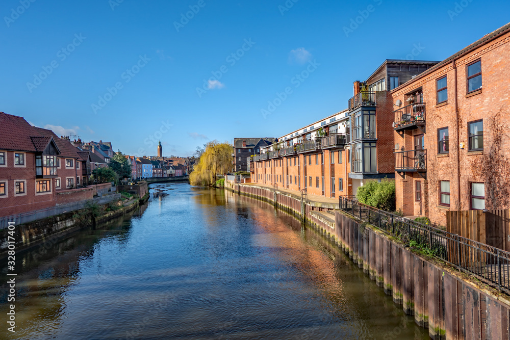 View from a bridge down the River Wensum in the city of Norwich