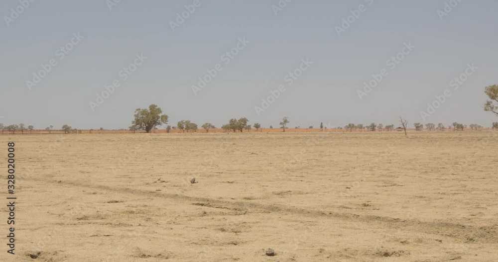 The dry and empty landscape of the arid country of the Australian Outback The dry and empty landscape of the arid country of the Australian Outback