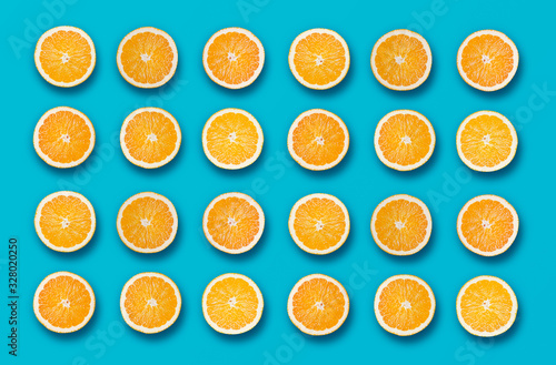 Orange Fruit Slices on Blue Background