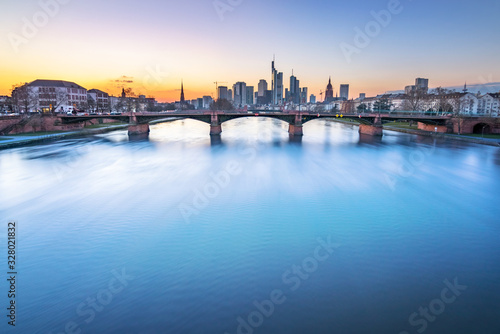 city at night, famous place frankfurt city.  Frankfurt in the sunset with its great skyline in Germany © Jan