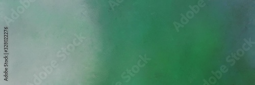 sea green and dark sea green color background with space for text or image. vintage texture, distressed old textured painted design. can be used as horizontal background graphic
