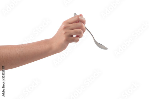 Close-up of woman's hand holding a tea spoon isolated on white background.