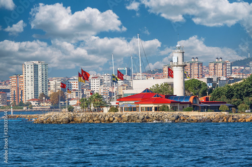 ISTANBUL, TURKEY - October 9th, 2019: Genuine architecture along the banks of Bosphorus, popular travel destination and significant passway between Europe and Asia. Bosphorus cruise.