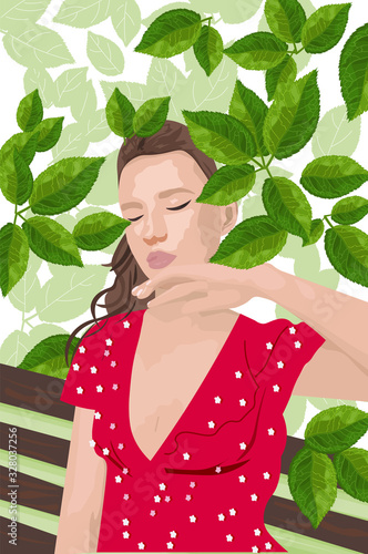 Young woman in red dress sitting on a bench and enjoying greenery