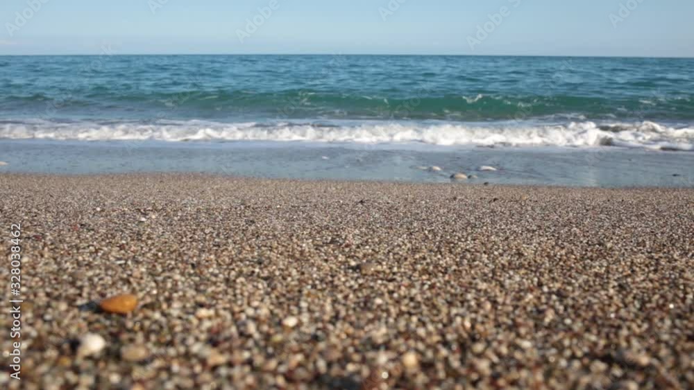 Beautiful empty sunny sea beach and blue sky. Beautiful empty sunny sea beach and blue sky.