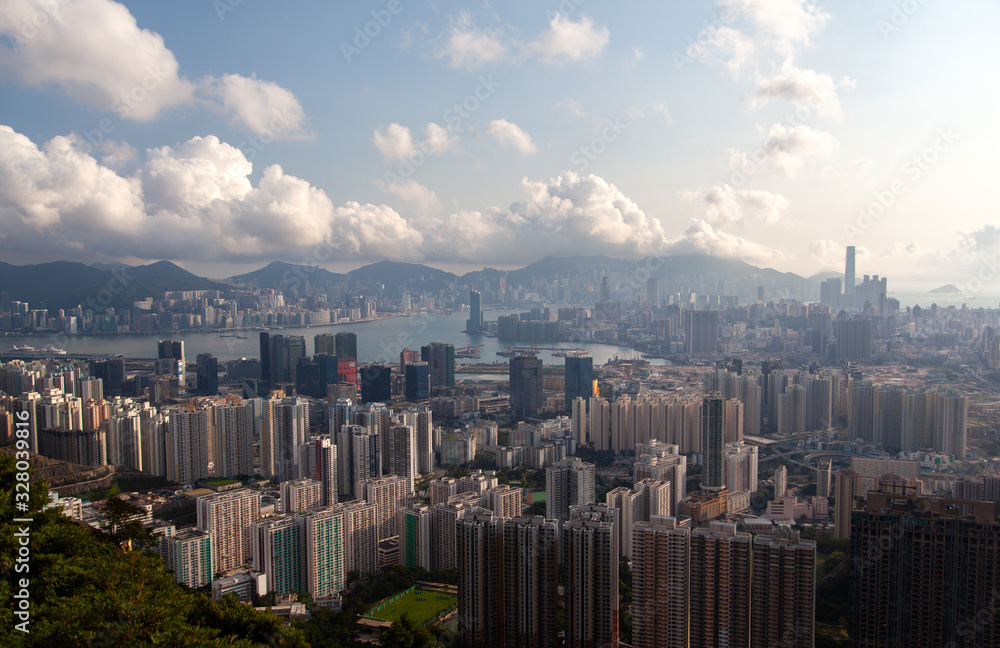 Cityscape Hong Kong city district under grey dense clouds