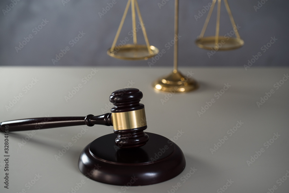 Law and Jusitce concept photo, silver stone background Law and Jusitce concept photo, silver stone background