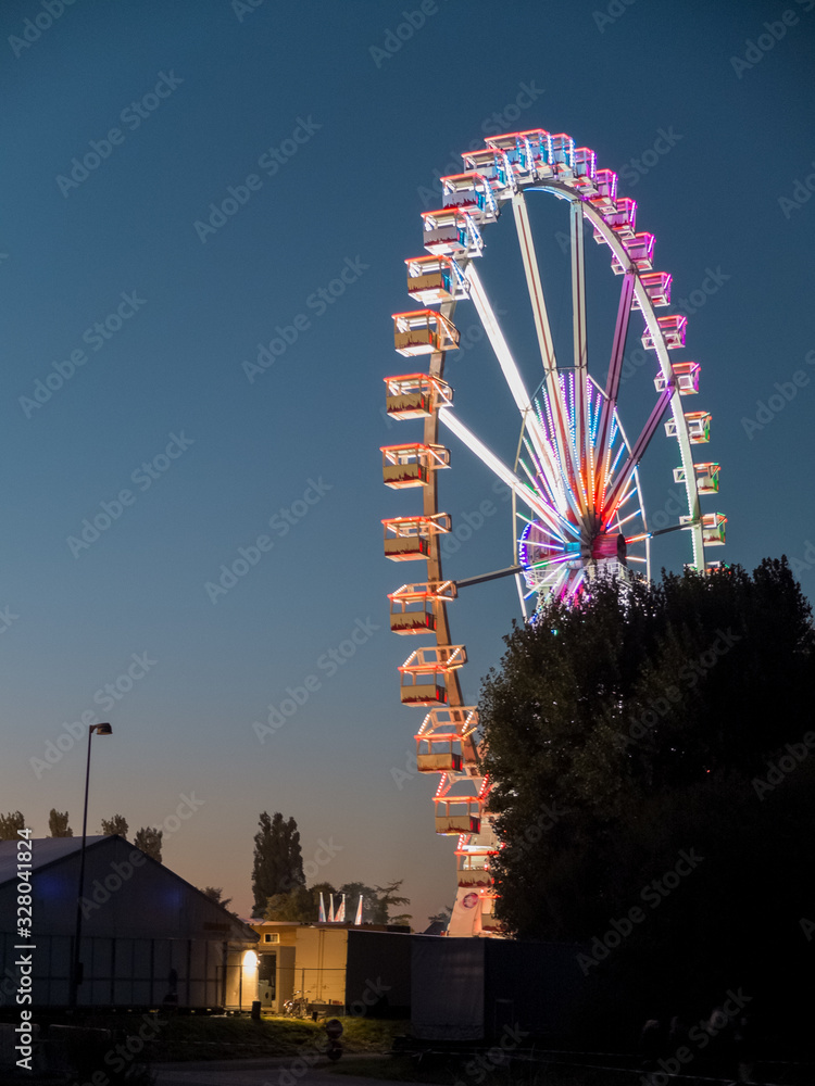 A view of the ferris wheel in the evening from the backyard.