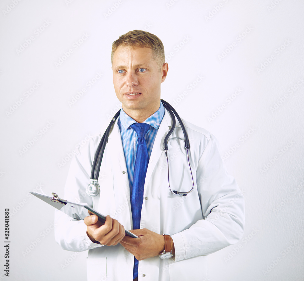 Young confident doctor in a white coat with a stethoscope Young confident doctor in a white coat with a stethoscope
