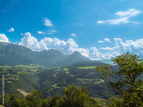 The view of the dolomite mountain is south Tirol in Italy. Sunny summer day with blue sky and clouds.