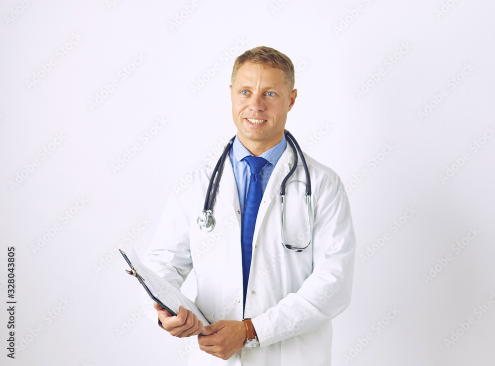 Young confident doctor in a white coat with a stethoscope Young confident doctor in a white coat with a stethoscope