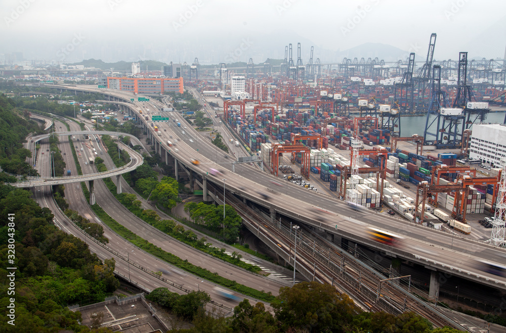 Container terminal wide overpass Hong Kong roads with heavy traffic