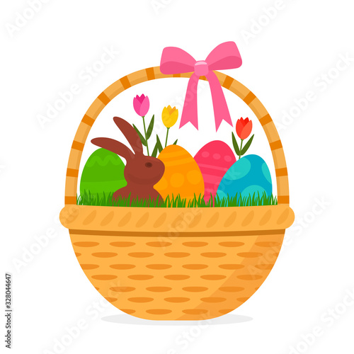 festive easter basket with a set of eggs with an ornament and flowers and a chocolate bunny rabbit.