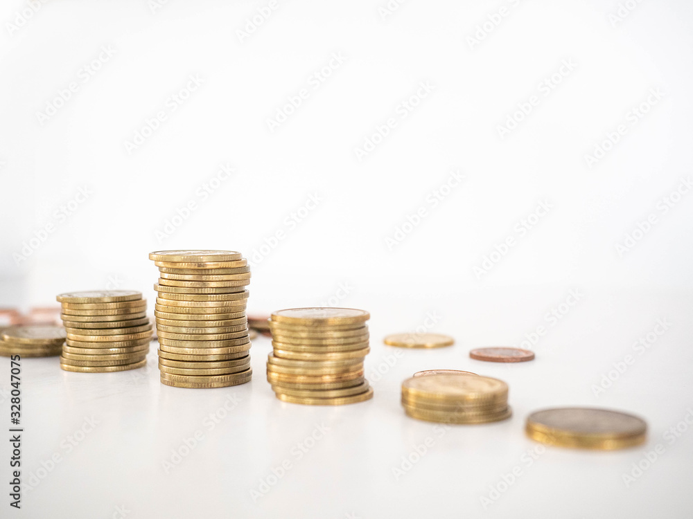 Thai Baht Coins colors Gold set in the mountains,Is the currency of Thailand.For business expenses,Coin is in a jar of money saving,White background Thai Baht Coins colors Gold set in the mountains,Is the currency of Thailand.For business expenses,Coin is in a jar of money saving,White background