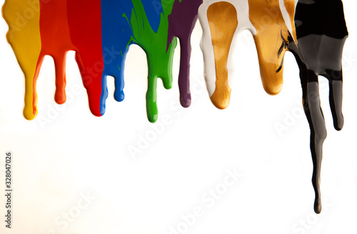 Colorful paint dripping isolated on a white background