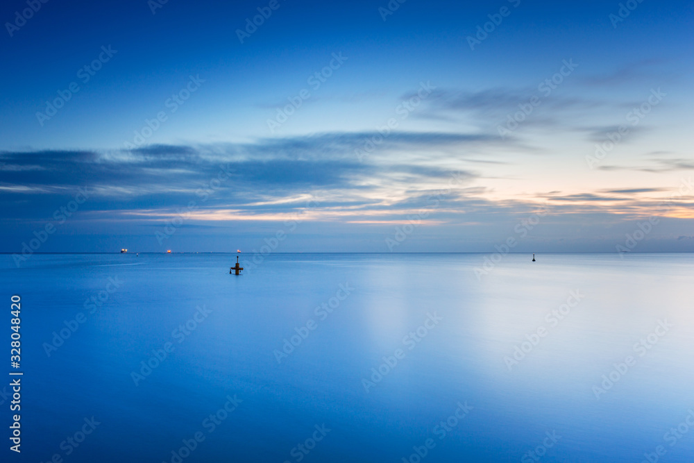 Beautiful sunrise over calm Baltic Sea in Poland Beautiful sunrise over calm Baltic Sea in Poland