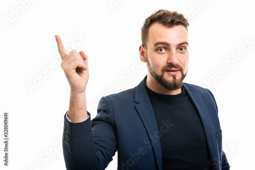 Business man wearing smart casual clothes making idea gesture