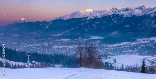 Fototapeta Naklejka Na Ścianę i Meble -  Winter panorama of the High Tatras and the Zakopane Resort in Poland