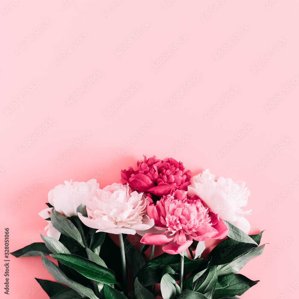 Beautiful flowers composition of peonies. Pink and white peonies flowers on pastel pink background. Flat lay, top view, copy space Beautiful flowers composition of peonies. Pink and white peonies flowers on pastel pink background. Flat lay, top view, copy space