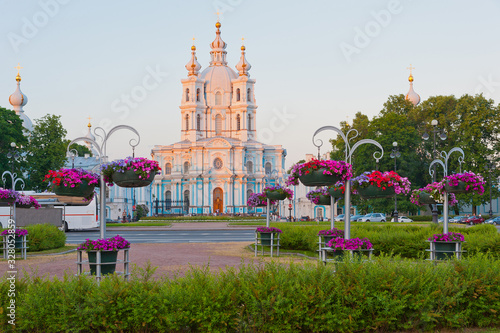 Smolny Cathedral and flower beds on a June evening, Saint Petersburg.