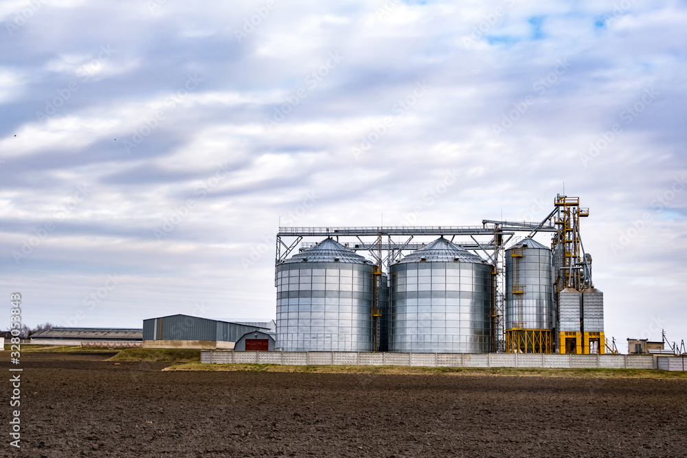 Granary elevator. agro-processing and manufacturing plant for processing and silver silos for drying cleaning and storage of agricultural products, flour, cereals and grain. Granary elevator. agro-processing and manufacturing plant for processing and silver silos for drying cleaning and storage of agricultural products, flour, cereals and grain.