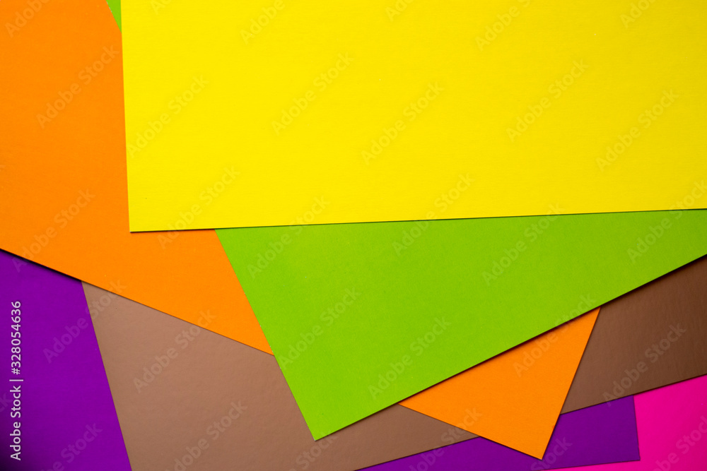 Sheets of multi-colored cardboard.