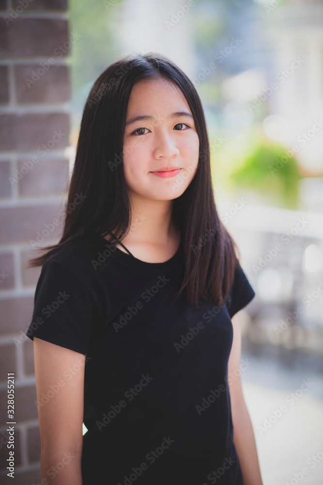 portrait asian teenager looking eye contact with happiness smiling face portrait asian teenager looking eye contact with happiness smiling face