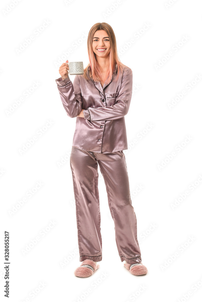 Portrait of woman in pajamas and with cup of coffee on white background Portrait of woman in pajamas and with cup of coffee on white background